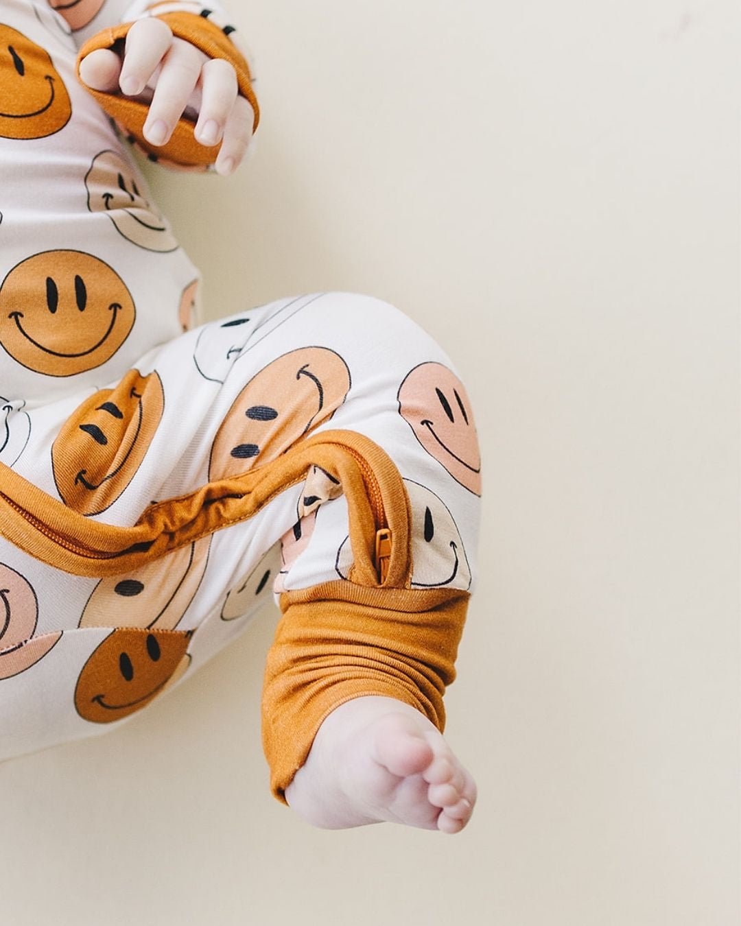 smiley bamboo zip romper, lucky panda kids baby pajamas, smiley face zip sleeper, zippy